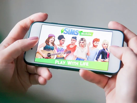 Image of the Sims game on an iPhone