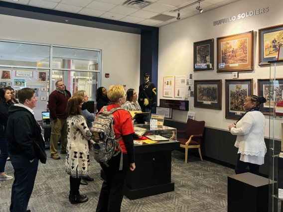 Group looking at Buffalo Soldiers exhibit